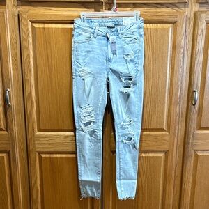American Eagle Outfitters Next Level Stretch Light Blue Ripped Skinny Jeans